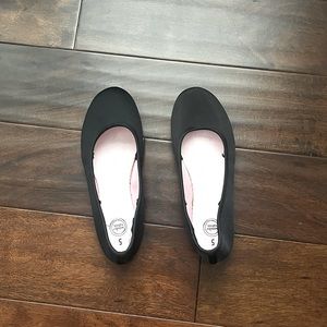 Plain black slip-on shoes
